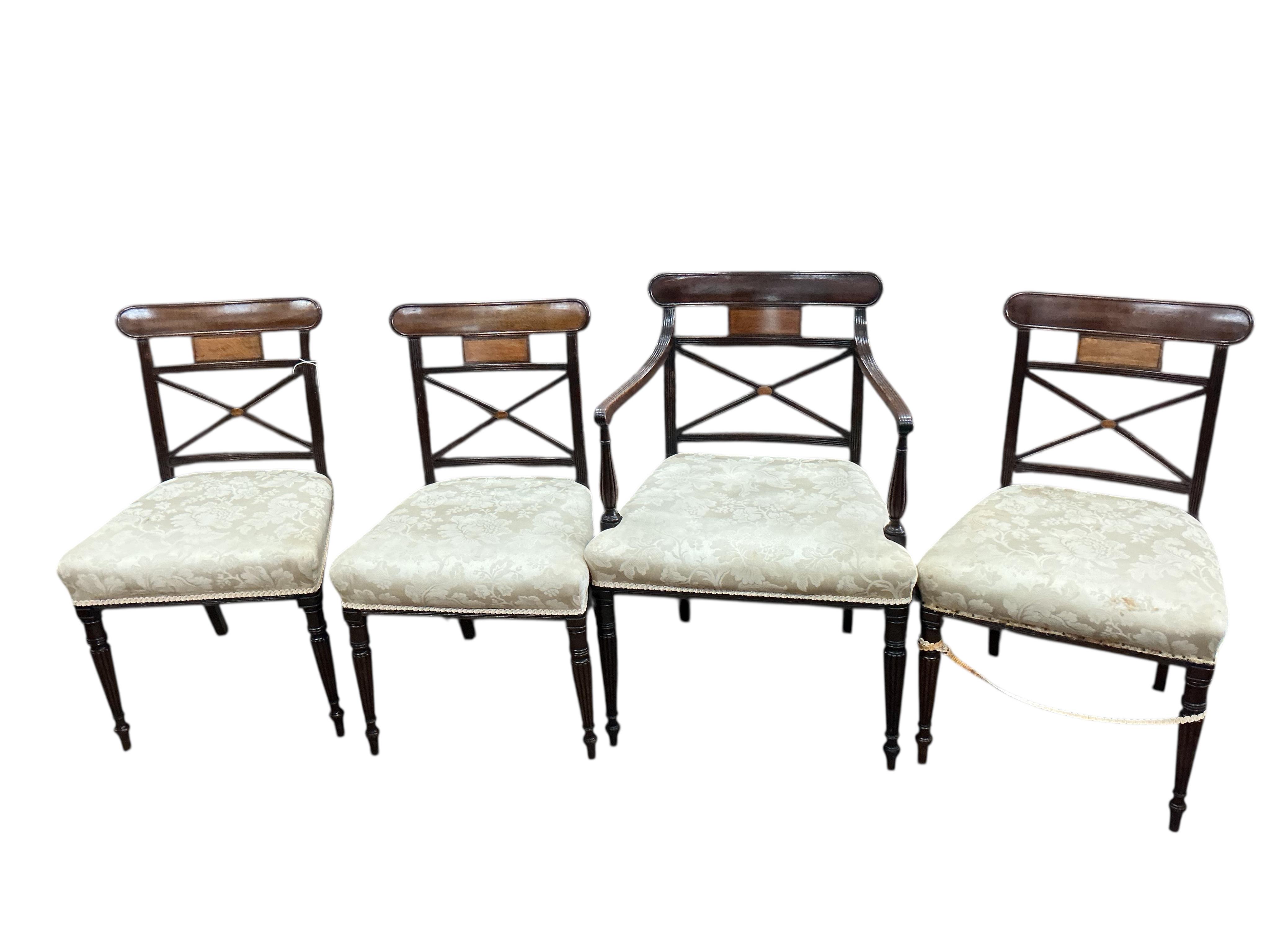 A set of eight Regency mahogany dining chairs, one with arms